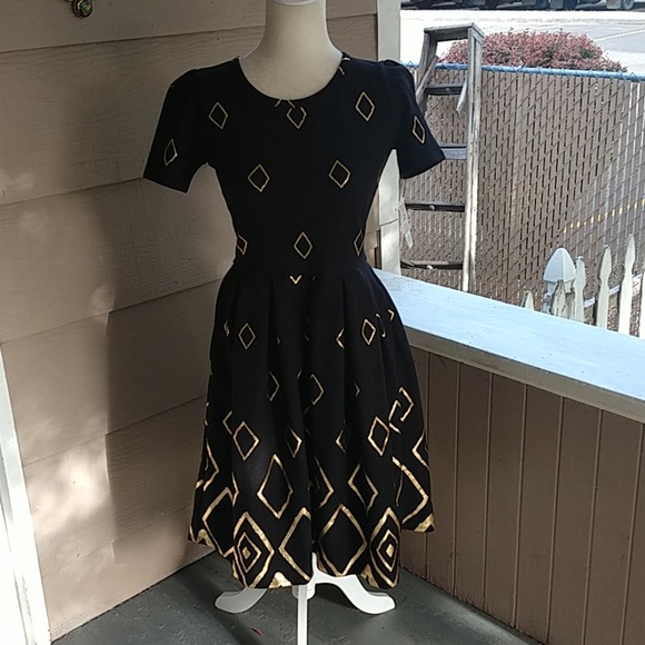 LuLaRoe Dresses & Skirts - NWT  Lularoe Amelia black and gold dress
